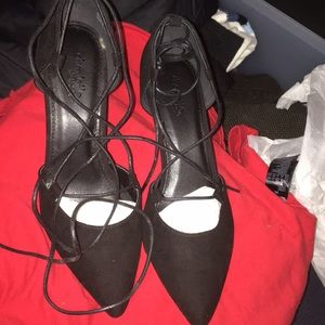 Black suede pumps